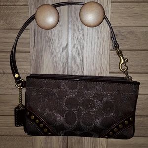 Coach dark brown metallic wristlet